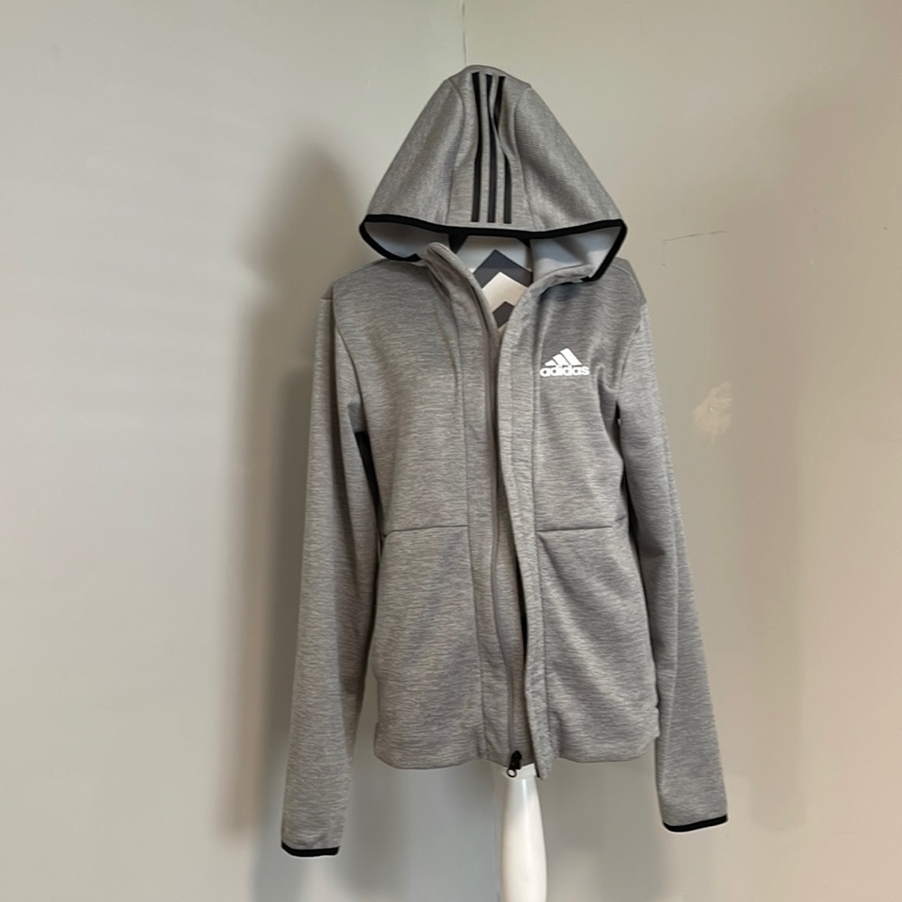Adidas men's zipper jacket.   Small size